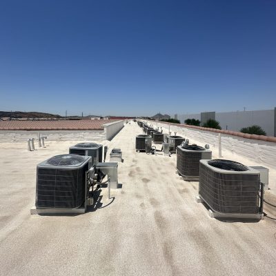 Multiple rooftop HVAC units serviced in